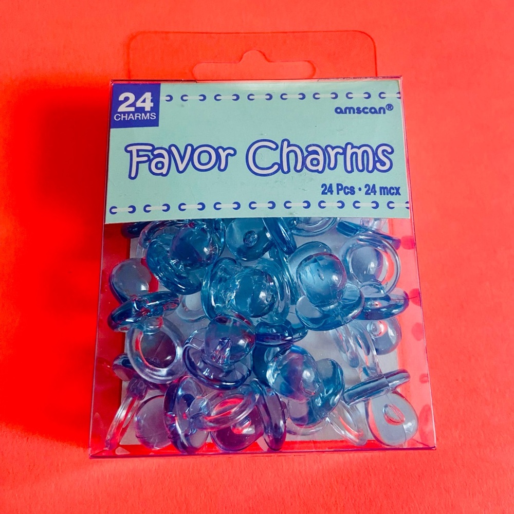 NWT. Pack of 24 baby pacifier charms for arts and crafts. New in box.